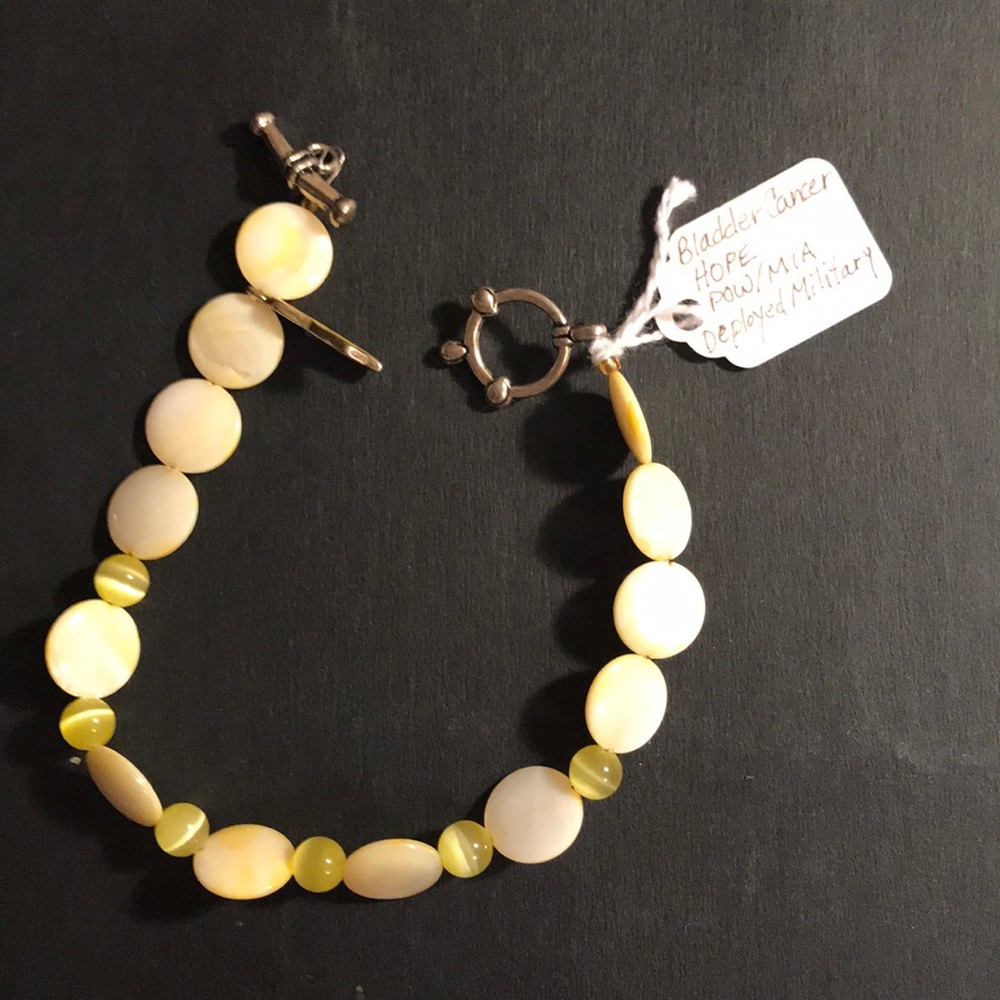 Handcrafted yellow awareness bracelet
